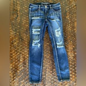 AMERICAN EAGLE distressed super low rise skinny jeans.  Size 8 regular.